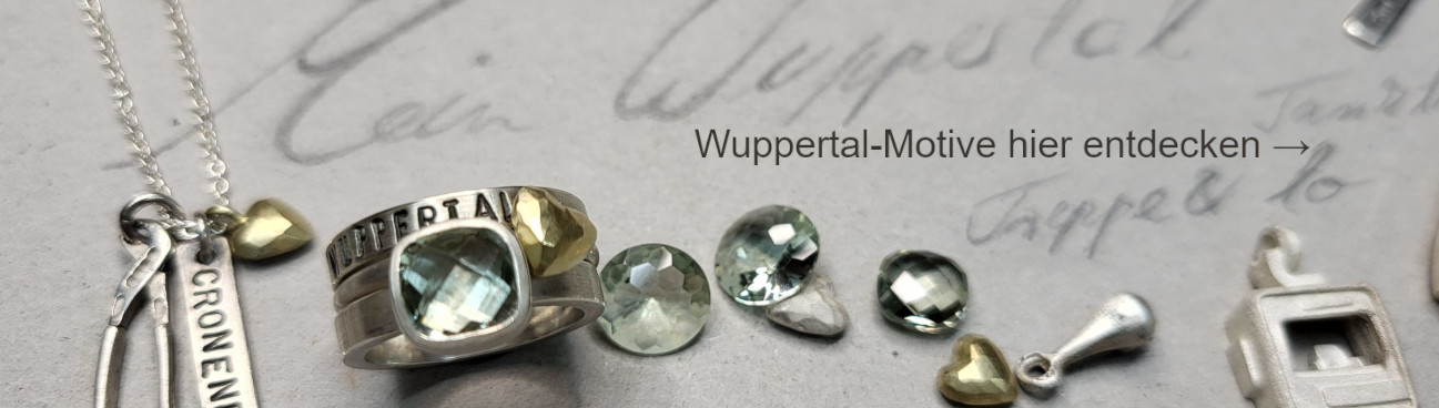 Handgefertigter Wuppertal-Schmuck und Schmuckentwürfe mit Schwebebahn, und anderen Wuppertal-Motiven.