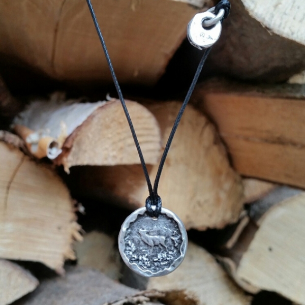 Metallsiegel mit gewachstem Schmuckband